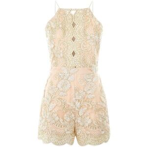 Parisian romper, never worn, size 8